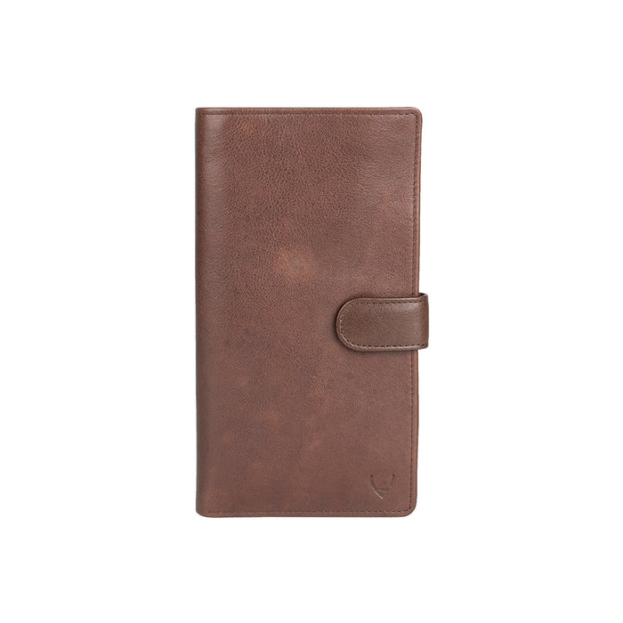 Brown leather passport holder with secure flap closure, designed for travel essentials by Hidesign.
