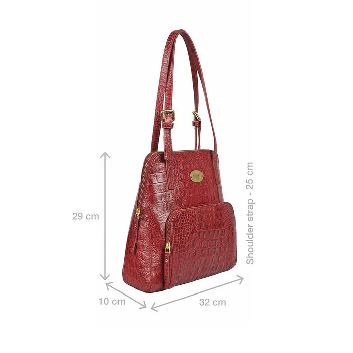 Side view of red crocodile-texture Hidesign leather tote bag with size details and adjustable strap.
