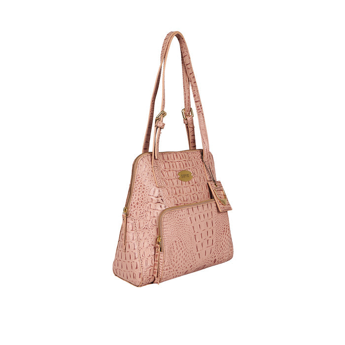 Hidesign's pink crocodile-textured leather tote bag for women with a front zip and shoulder straps.