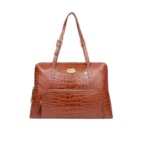 Graceful tan croc-embossed leather tote with dual shoulder straps, front zip pocket, and roomy body.
