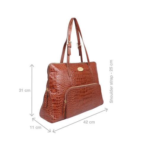 Angled tan croc-embossed tote bag with front pocket, dual straps, and size markings displayed fully.