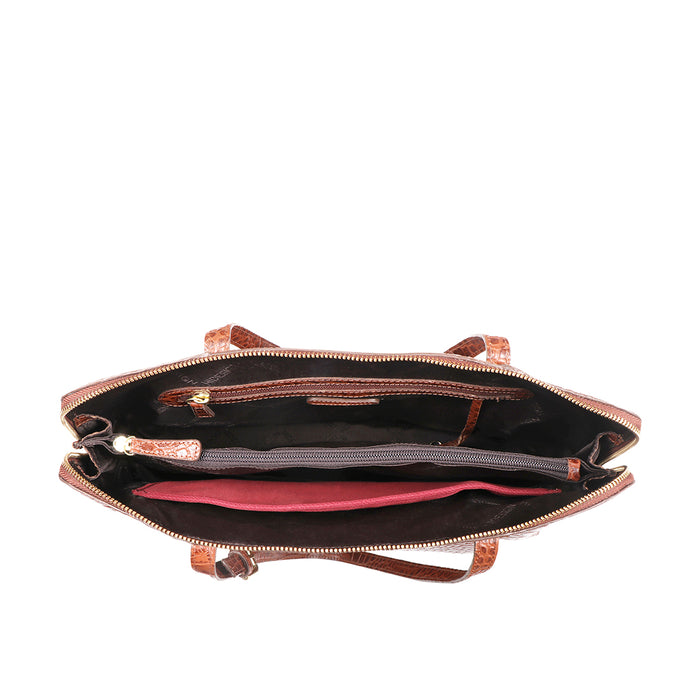 Revealing an organised tote interior with a zip compartment, slip pockets, and spacious sections.