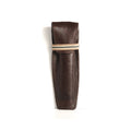 Featuring a brown leather key chain pouch with striped elastic band closure and slim profile fit.