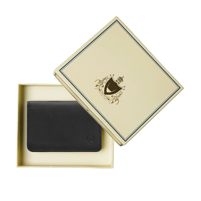 Black leather bifold wallet placed in a beige gift box with a crest logo lid on white background set