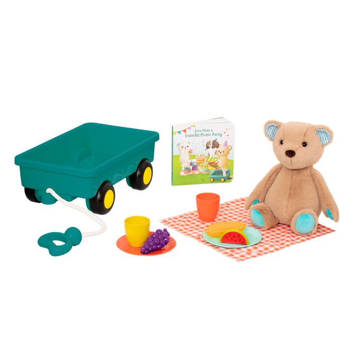Plush bear with picnic playset and book.