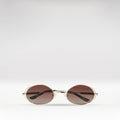 Calypso Women's Brown Retro Oval Sunglasses