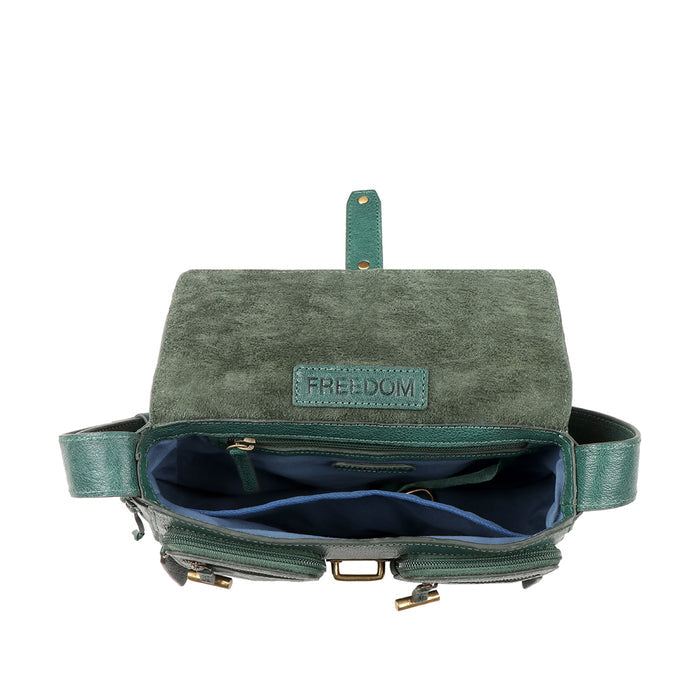 Open green leather shoulder bag showing organized compartments and 'FREEDOM' tag under flap.