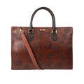 Kester women's brown leather laptop bag with black leaf embossing, top handles, & detachable strap.