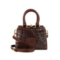 Hidesign Ritz 01 women’s brown sling bag with croc-texture leather and detachable shoulder strap.